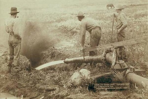 A Golden work. Hydraulic mining. by John C.H. Grabill - Art Print