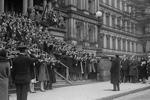 A hundred Massed Violins on the Steps of the Navy Building in Washington