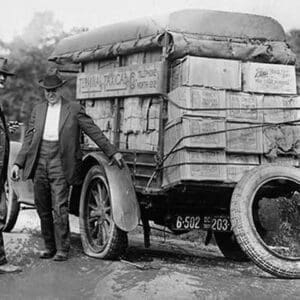 Agents capture a vehicle loaded with liquor as it got a flat tire - Art Print