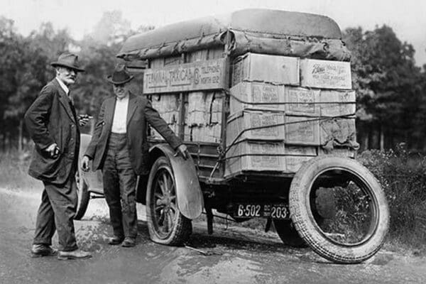 Agents capture a vehicle loaded with liquor as it got a flat tire - Art Print