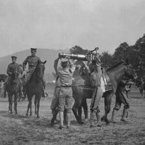 Army Cadets Lift Large Artillery Piece from a Horse - Art Print