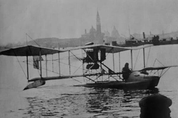 Biplane Land in the Canals of Venice; Captain Ginocchio's Airplane - Art Print