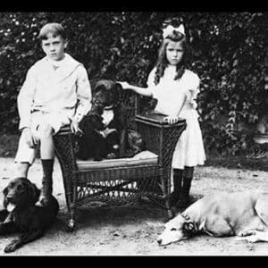 Boy and Girl with Their Four Dogs - Art Print