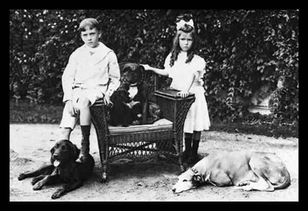 Boy and Girl with Their Four Dogs - Art Print