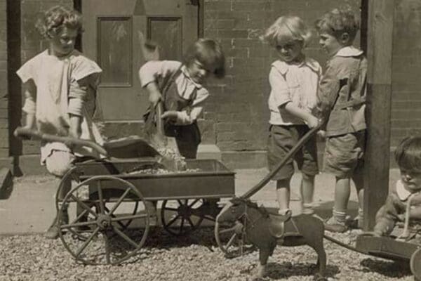 Children Load stones in Wagon with Shovel by Tarbox - Art Print