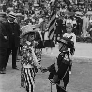 Costumed Child dressed as Uncle Sam welcomes another toddler representing the Italian community of the United States for an Italy-American Friendship Even held in New York City - Art Print