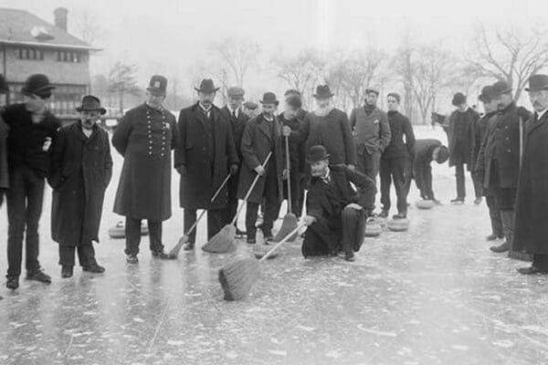 Curling in Central Park with Men having Brooms at the ready over the ice. - Art Print