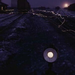 Eerie view of the lights in the train yard - Art Print