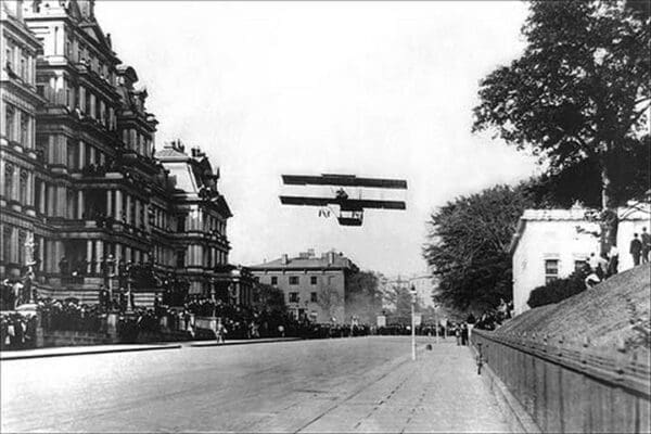 Farman Biplane over Washing ton D.C. - Art Print