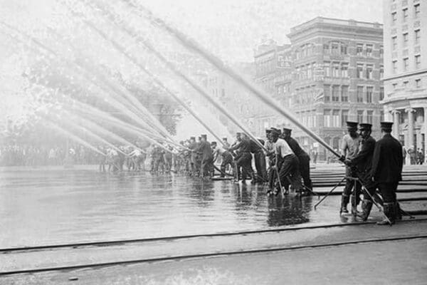 Fireman testing high-pressure hoses