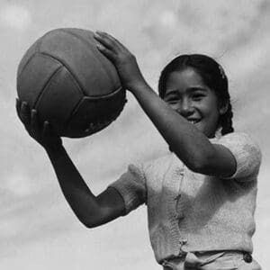 Girl and volley ball by Ansel Adams - Art Print