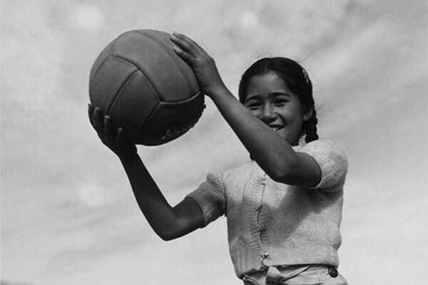 Girl and volley ball by Ansel Adams - Art Print