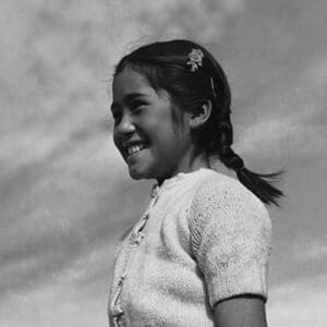 Girl smiling by Ansel Adams - Art Print