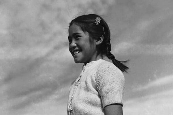 Girl smiling by Ansel Adams - Art Print