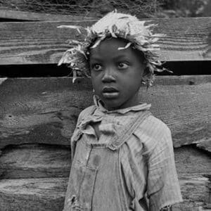 Grandson of Negro tenant whose father is in the penitentiary by Dorothea Lange - Art Print