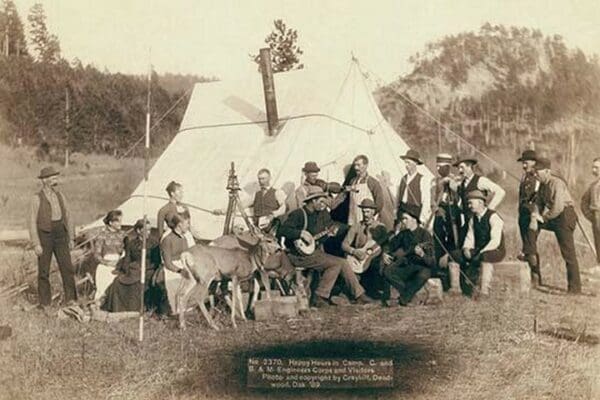 Happy Hours in Camp. G. and B.&M. Engineers Corps and Visitors by John C.H. Grabill - Art Print