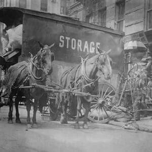 Horse Drawn Wagon with sign saying STORAGE unload the home content of a family being evicted - Art Print