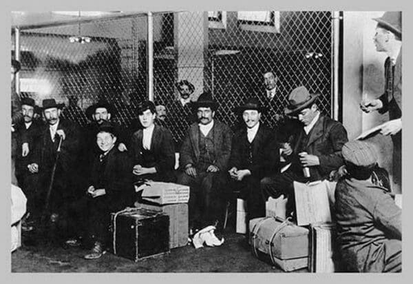 Immigrant Men Sitting at Ellis Island - Art Print