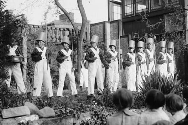 Line of Boys pose as Soldiers with inverted pails on their heads #2 - Art Print