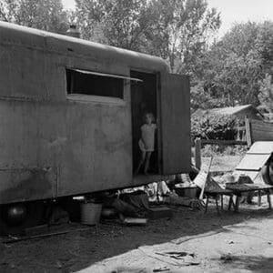 Little Girl in Hous Trailer by Dorothea Lange - Art Print