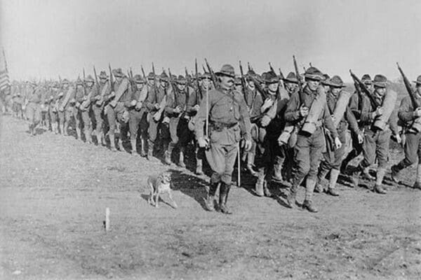 Marching US Infantry in Texas as a mascot dog is near the head of the column - Art Print