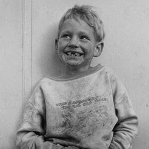 Migrant child in Shafter camp by Dorothea Lange - Art Print