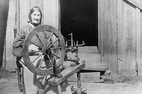 Mountain Women at a Spinning Wheel - Art Print