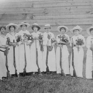 Nemours Women's Trap shooting Club in elegant dress hold both nosegays and rifles. - Art Print