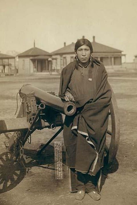 Oglala Sioux Plenty Horse Next to Cannon by John C.H. Grabill - Art Print