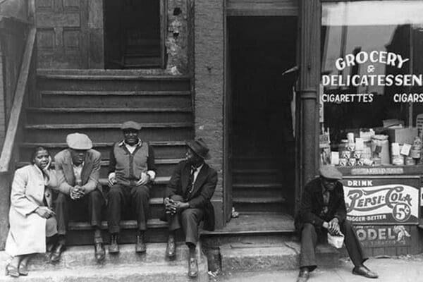 People sitting on front porches in Negro section of Chicago