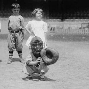 Pint sized Catcher awaits a pitch in Children's Baseball Game - Art Print