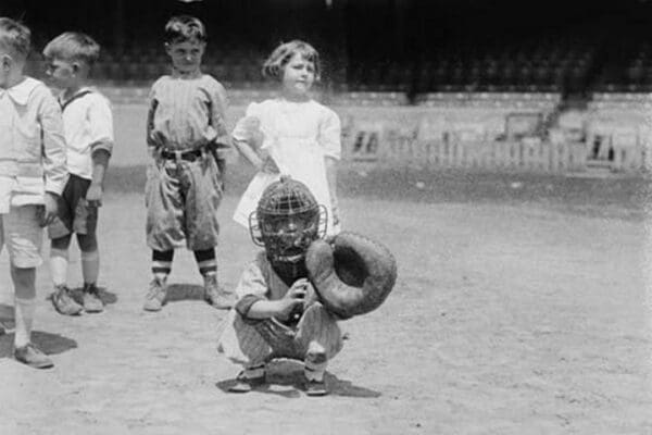 Pint sized Catcher awaits a pitch in Children's Baseball Game - Art Print