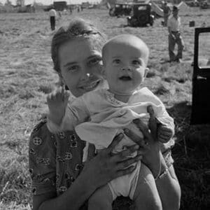 Potato Picking Mother with Baby by Dorothea Lange - Art Print