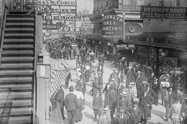 Surf Avenue in Coney Island Abustle with throngs of revelers - Art Print