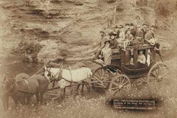 Tallyho Coaching. Sioux City party Coaching at the Great Hot Springs of Dakota by John C.H. Grabill - Art Print