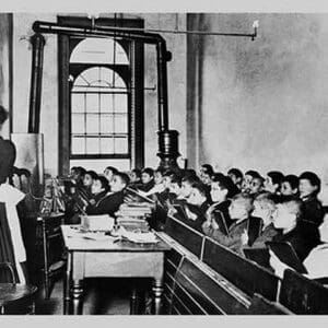 Teacher Instructs Students from Blackboard in Classroom - Art Print