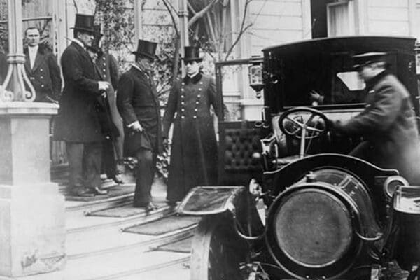 Teddy Roosevelt leaving U.S. Ambassador Bacon's residence to call on Fallerieres