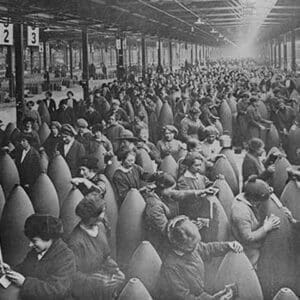 Throngs of women interspersed amongst large artillery shells on a factory floor. - Art Print