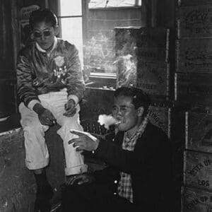 Two Young Men in Co-Op Goods Store by Ansel Adams - Art Print