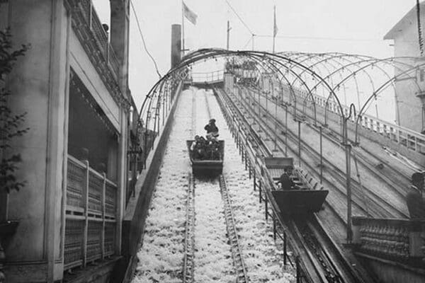 Waterslide enthusiast rides rails on Coney Island Amusement Park - Art Print