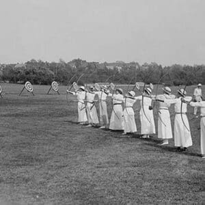 Woman's Archery Team Fires Arrows at a line of targets - Art Print